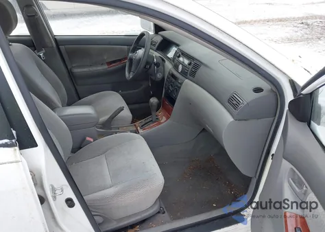 2003 Toyota Corolla Le z USA, uszkodzony, nr VIN JTDBR32E732015404